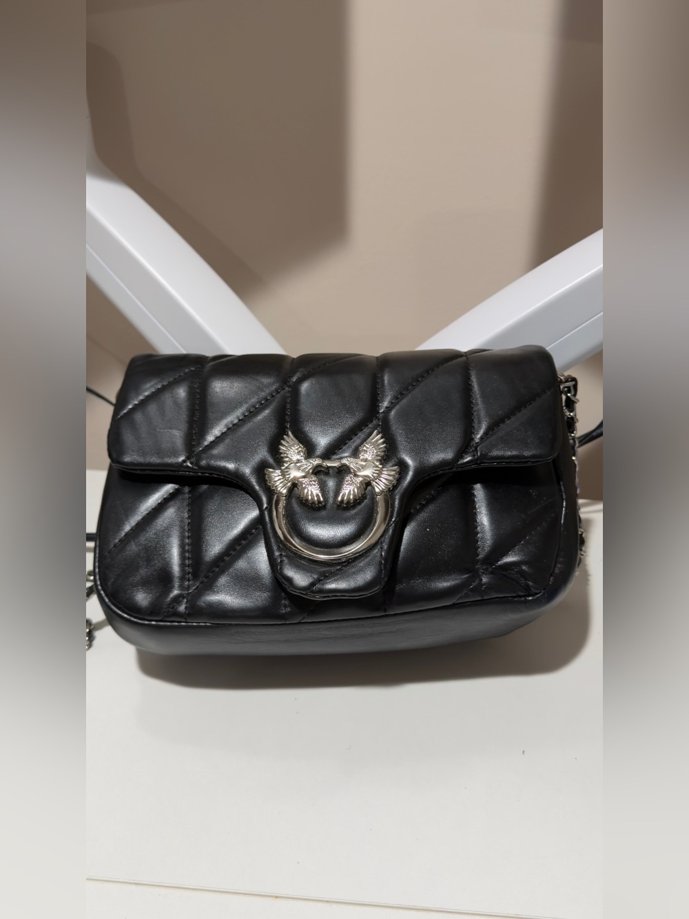 Black Quilted Shoulder Bag with Silver Bird Ring Hardware